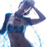 Esha Gupta looks smoking hot as she poses in a blue and green two piece bikini