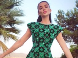 Amy Jackson is a diva in a short dress as she flaunts her long legs in a risqué slit high up the thigh