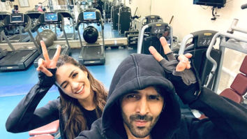 Shehzada stars Kartik Aaryan and Kriti Sanon pose in the gym as they workout together