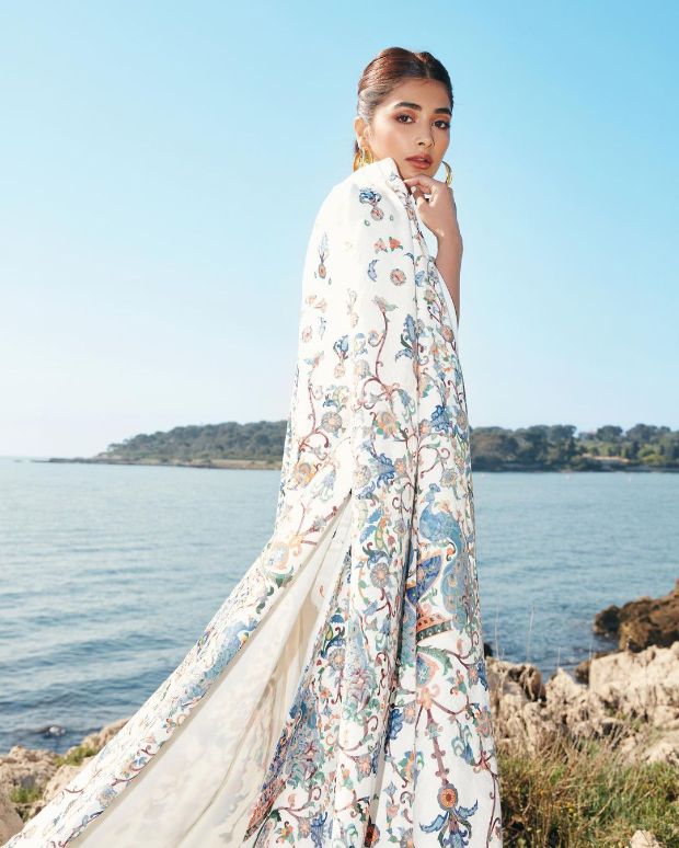 Cannes 2022: Pooja Hegde is epitome of grace and panache in floral printed jacquard strapless dress and long cape worth over Rs. 2 lakh 
