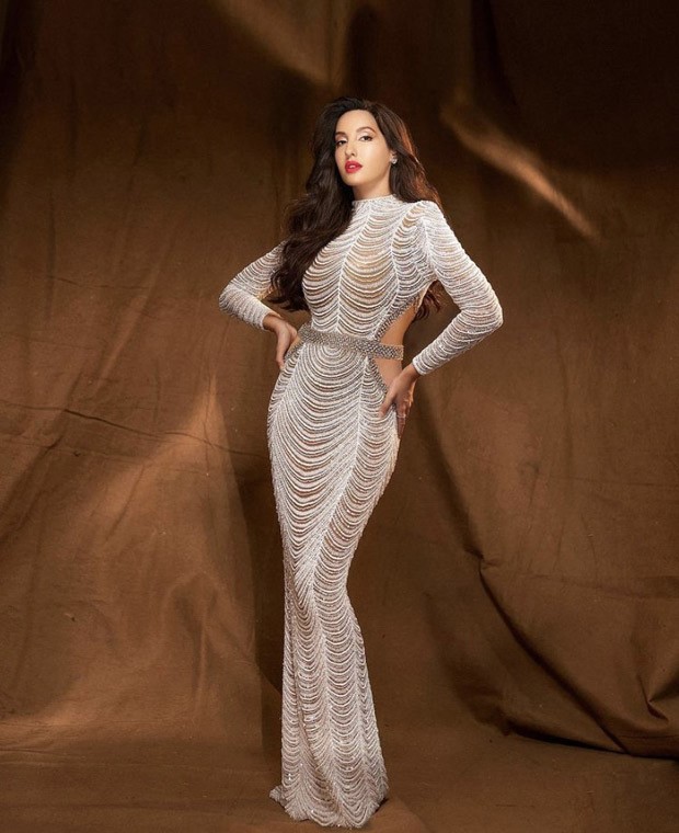 Nora Fatehi casts a spell in white shimmer bodycon gown worth Rs. 2.6 Lakh for Dance Deewane Juniors