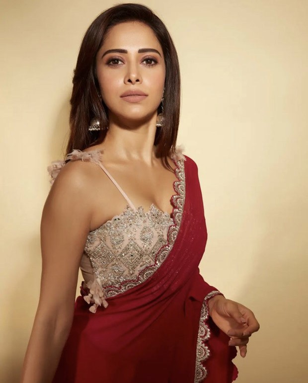 Nushrat Bharuccha looks stunning in red saree and pink bralette in latest photo shoot