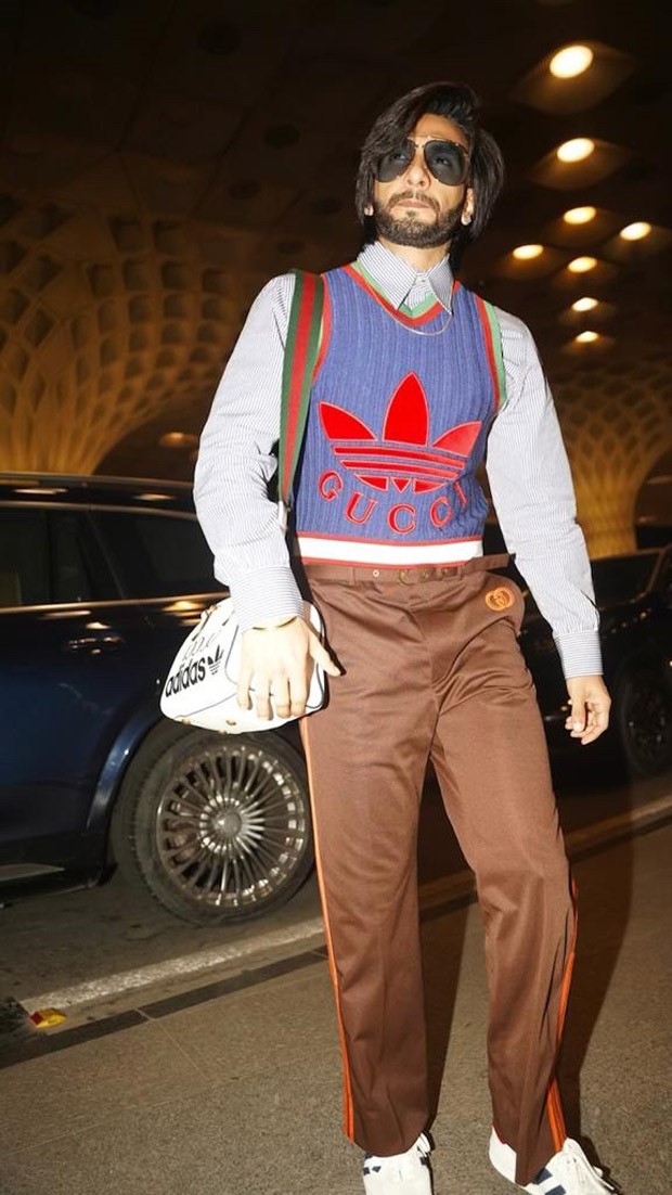 Ranveer Singh shows off an Adidas x Gucci haute couture tracksuit at the airport as he leaves for his birthday