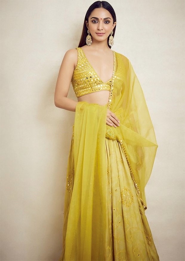 Kiara Advani looks splendid in mustard coloured lehenga with plunging neckline worth Rs. 68,000 for Jugjugg Jeeyo promotions 