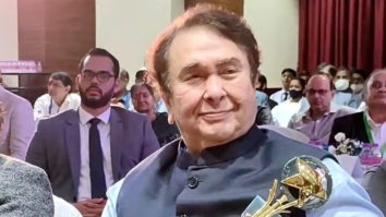 Randhir Kapoor smiles as he poses with his award