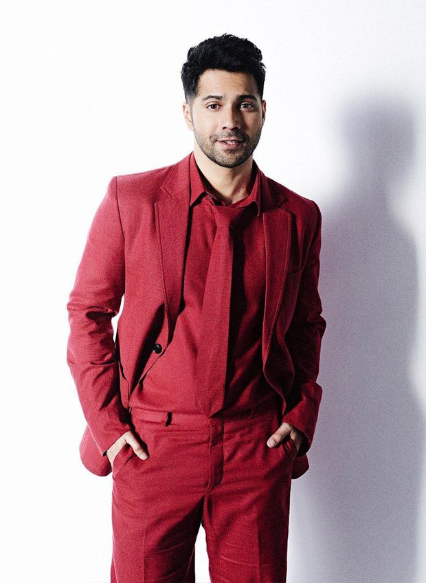 Varun Dhawan looks suave in red coloured suit for Koffee with Karan