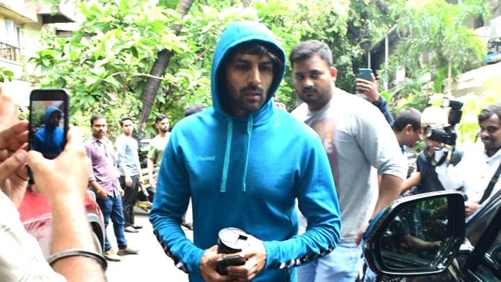 Kartik Aaryan gets snapped in the city in a blue hoodie