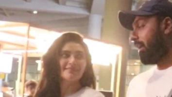 Karishma Tanna poses with her husband for paps