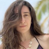 Karisma Kapoor drops a sizzling photo in purple sequined swimsuit from beach vacation