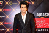 Maniesh Paul poses for paps in a stylish black suit