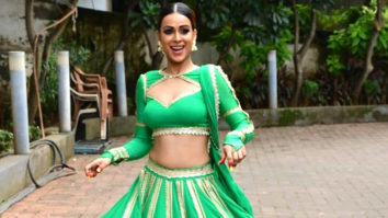 Nia Sharma poses for paps in bright green lehenga