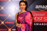Radhika Apte poses in a floral saree with low bun