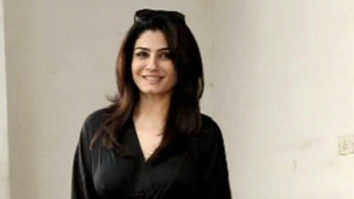 Raveena Tandon poses for paps in a black outfit