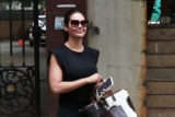 Esha Gupta smiles for paps in black outfit