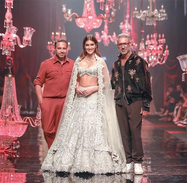Kriti Sanon rules the runway on the opening day of FDCI X Lakmé Fashion Week 2022 while donning a glittering ivory lehenga by Shantanu & Nikhil